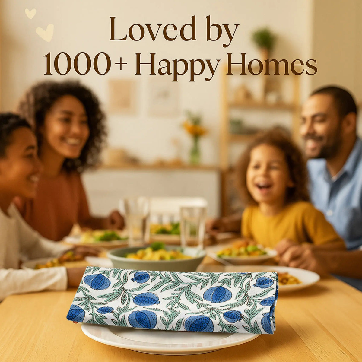 Family enjoying a meal together with a floral clutch in the foreground.