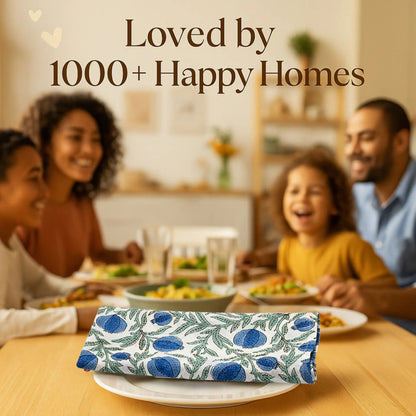 Family enjoying a meal together with a floral clutch in the foreground.