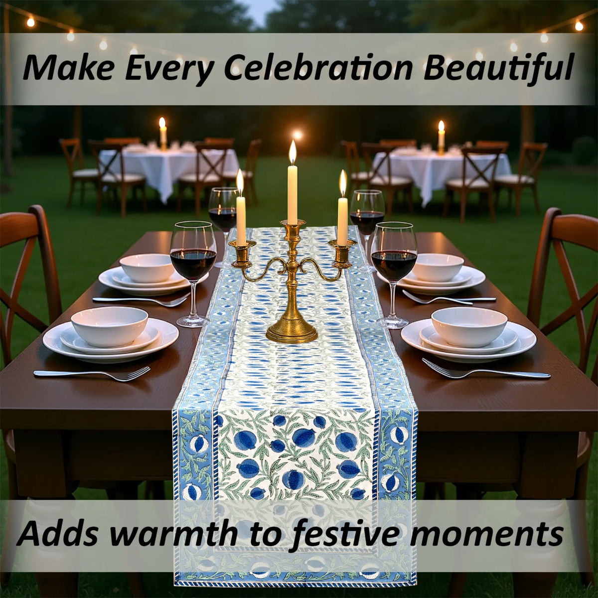 Dining table set for a celebration with a decorative table runner, candles, and wine glasses.
