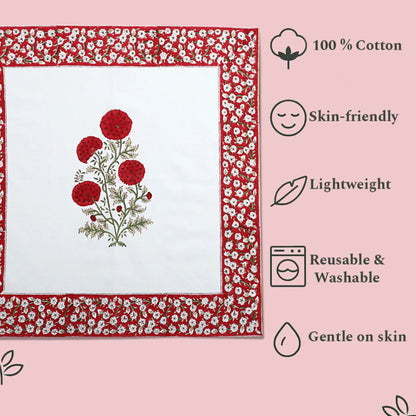 Floral design on a fabric with text highlighting features like 100% cotton, skin-friendly, lightweight, reusable, washable, and gentle on skin.