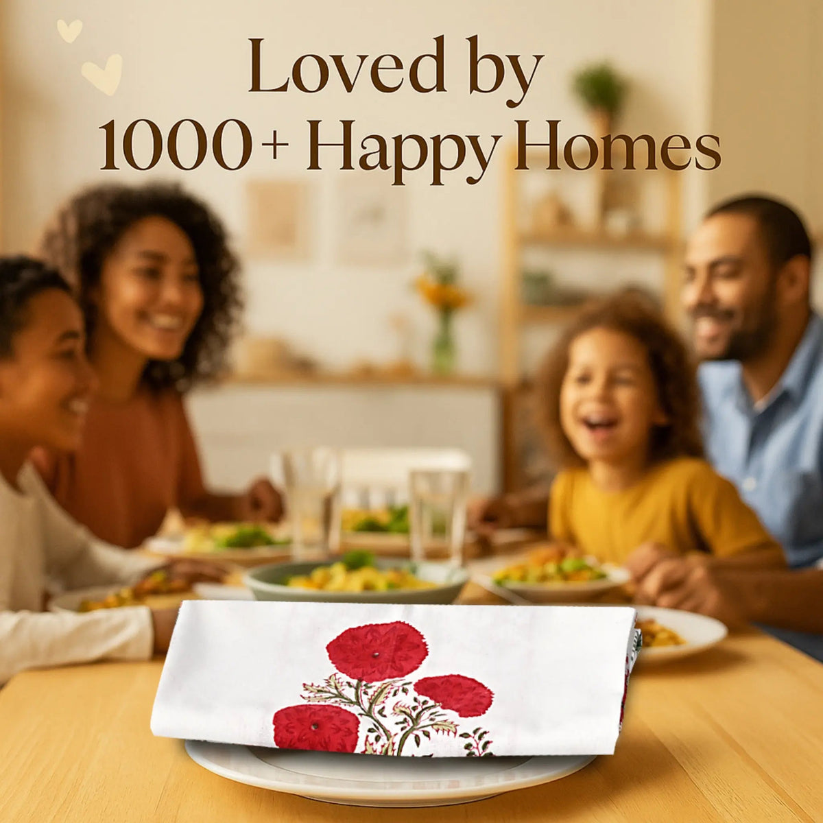 Family dining together with a decorative napkin featuring red flowers on a wooden table.