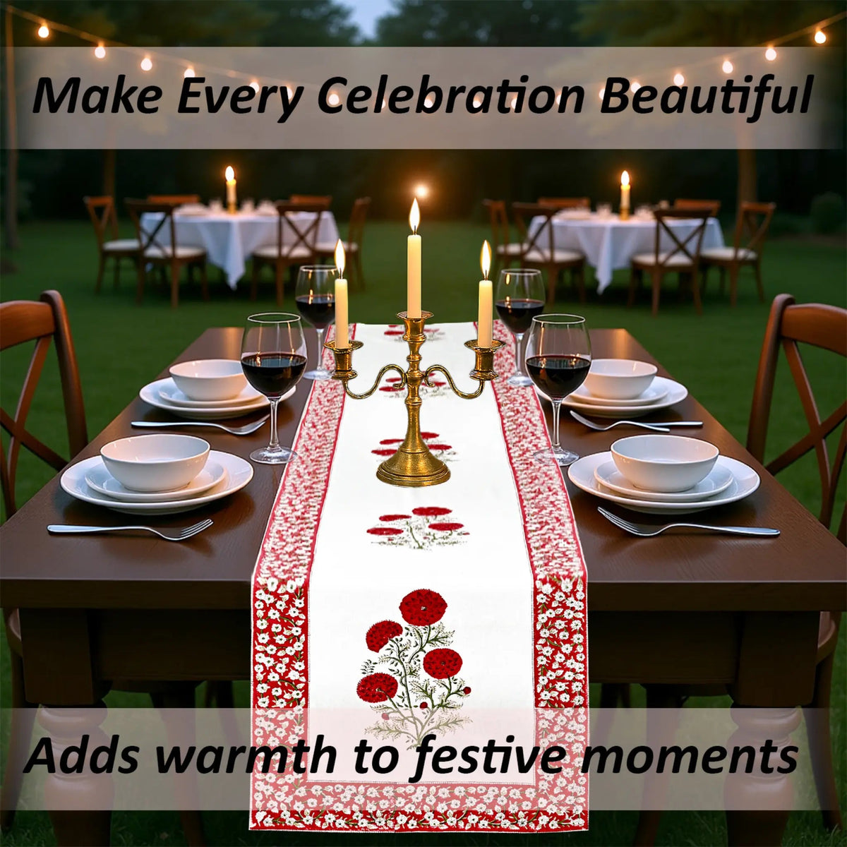 Dining table set with a decorative table runner, candles, and wine glasses outdoors.