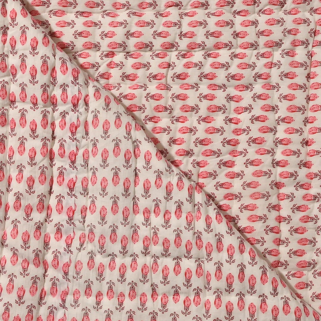 Fabric with pink floral pattern on a beige background