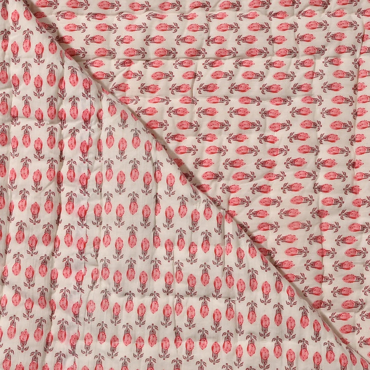 Fabric with pink floral pattern on a beige background