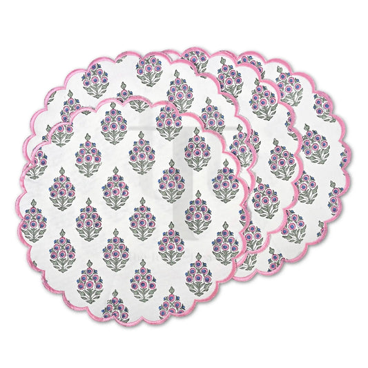 Set of round placemats with floral pattern on a white background