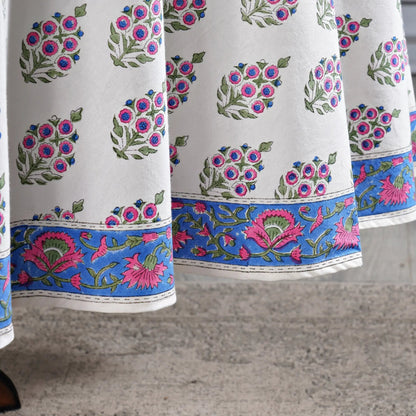 Close-up of a fabric with floral patterns on a textured surface