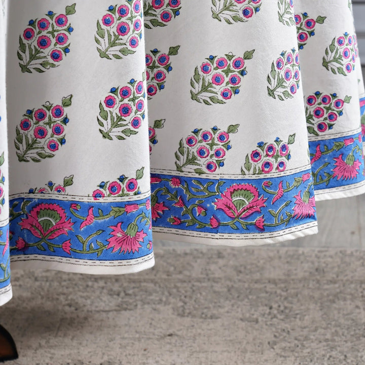 Close-up of a fabric with floral patterns on a textured surface
