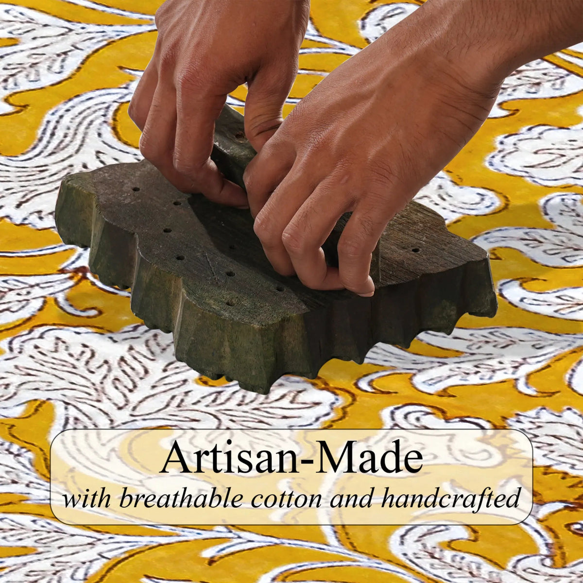 Hands using a stamp on fabric with 'Artisan-Made' text overlay