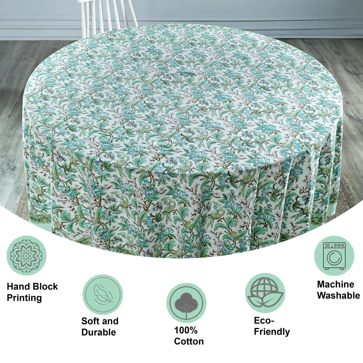 Floral patterned tablecloth on a round table with certification icons at the bottom.