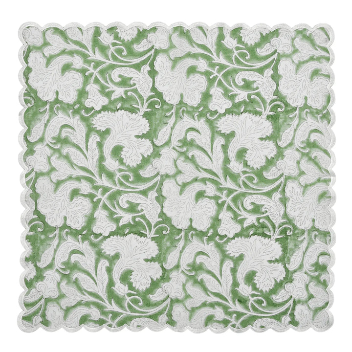Decorative square mat with white floral pattern on a green background