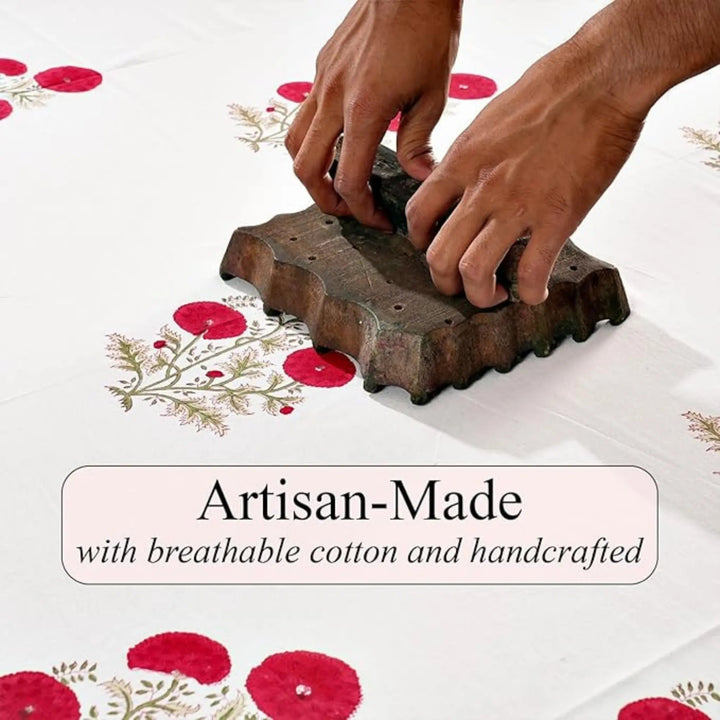 Hands using a brick mold on a floral-patterned surface with &