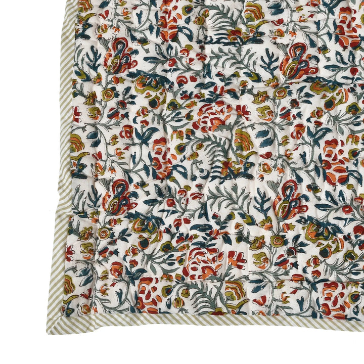 Floral patterned fabric with a white background