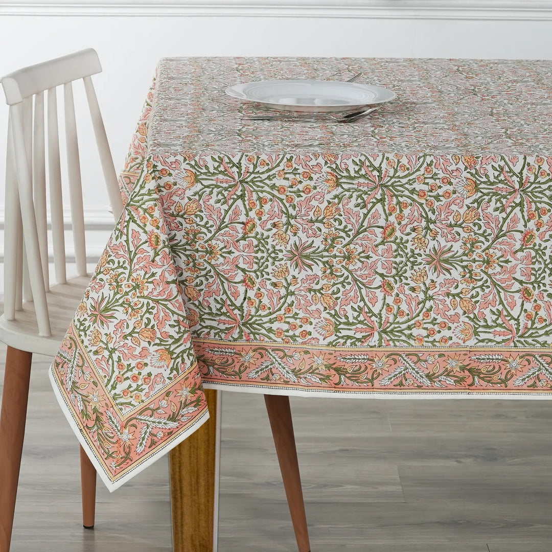 Tablecloth with floral pattern on a wooden table