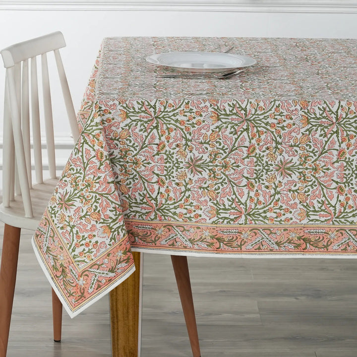Tablecloth with floral pattern on a wooden table