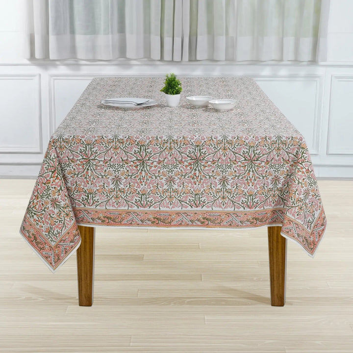Tablecloth with floral pattern on a wooden table
