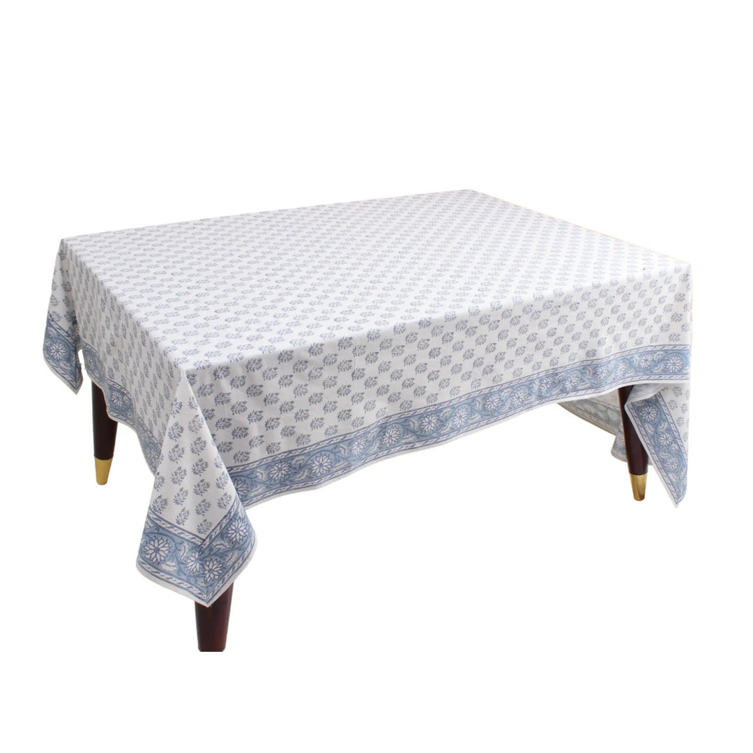 Tablecloth with blue floral pattern on a white background