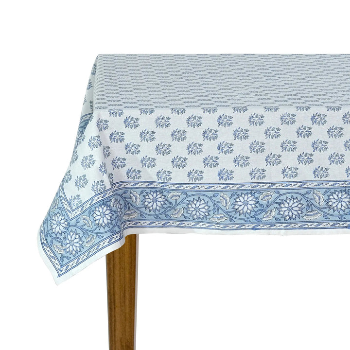 Tablecloth with blue floral pattern on a white background