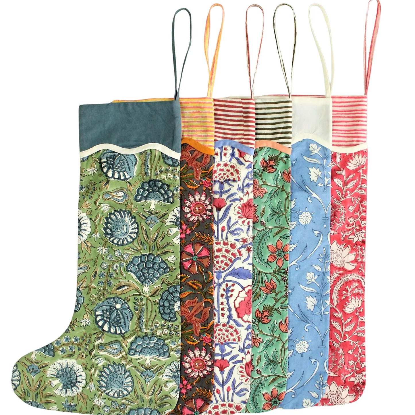Set of colorful fabric bags with floral patterns on a white background