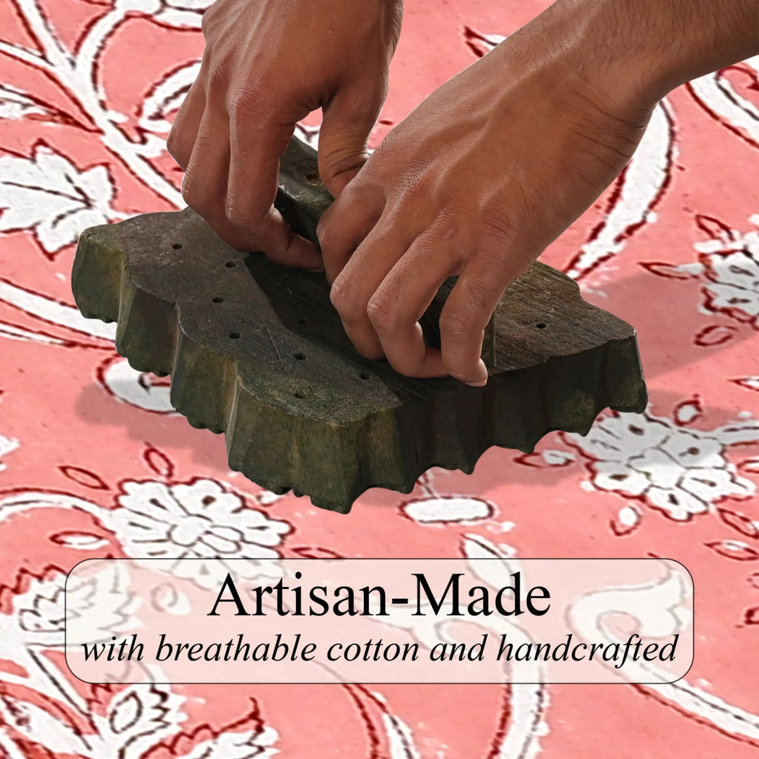 Hands holding a green woven item against a pink floral background with &