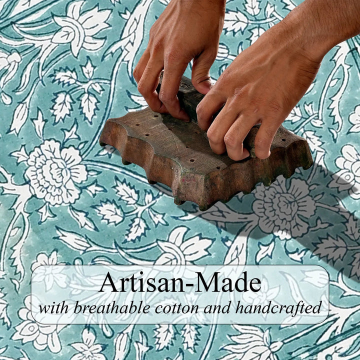 Wooden stamp being used on fabric with floral pattern, text &