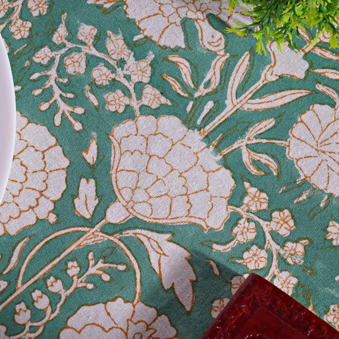 Floral patterned fabric with green background