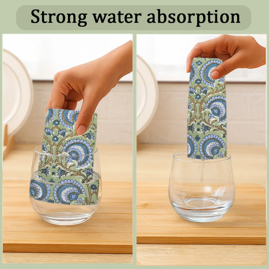 Hand holding a floral-patterned card over a glass of water with text &