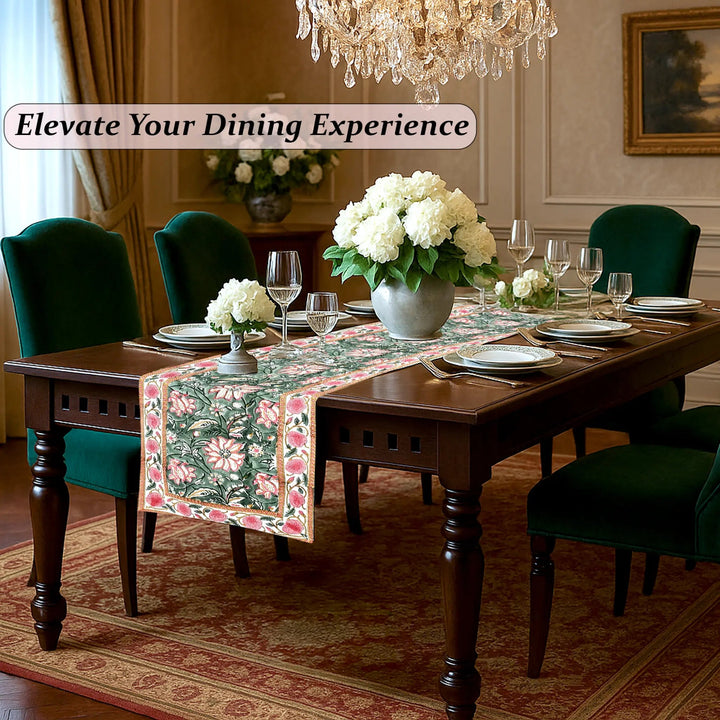 Dining room with a table set for a meal, flowers, and a chandelier.