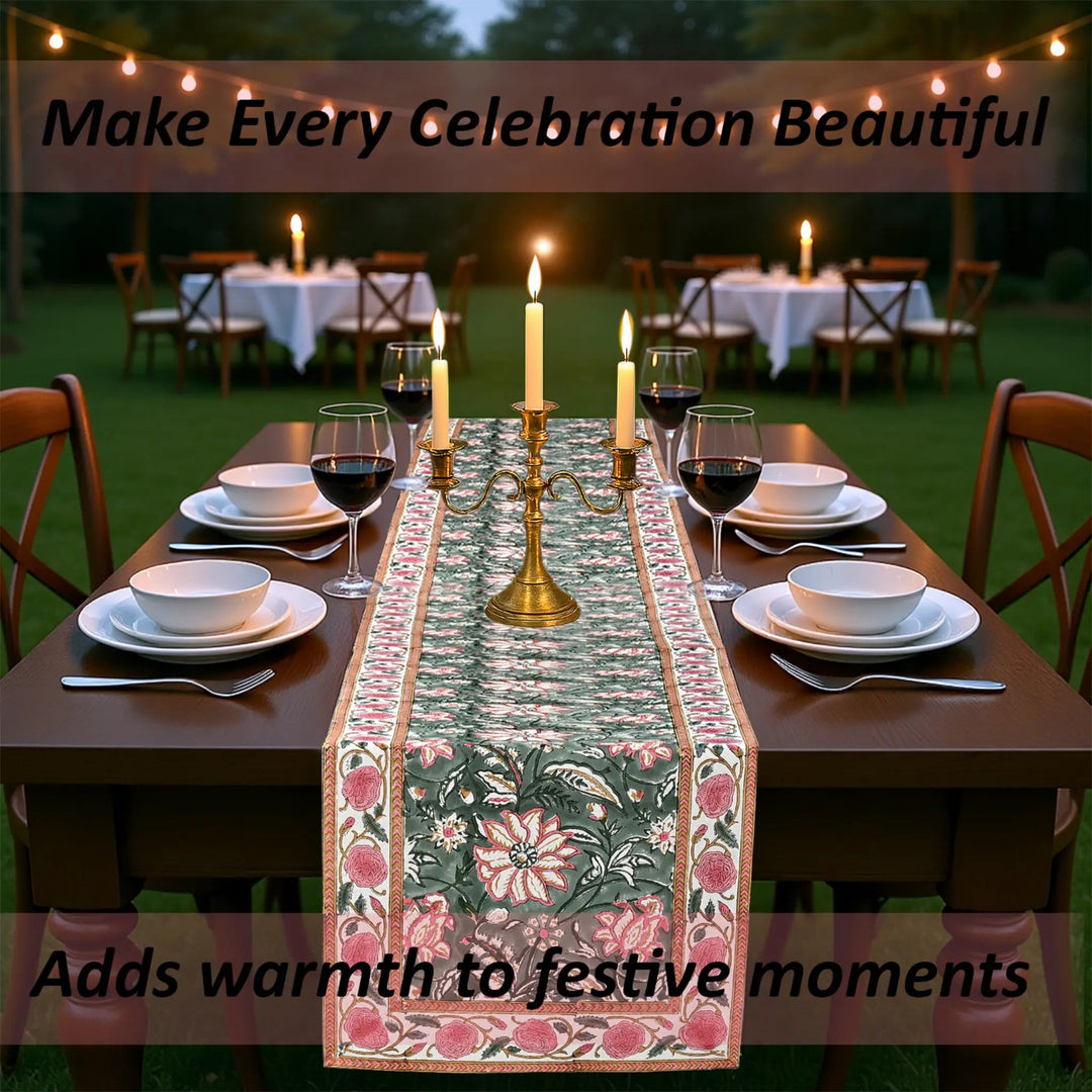 Decorative table runner on a set dining table with candles and wine glasses, outdoor setting.
